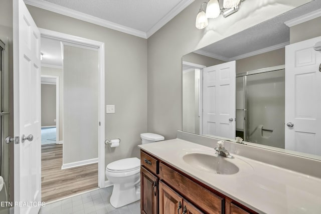 full bathroom with crown molding, toilet, and an enclosed shower