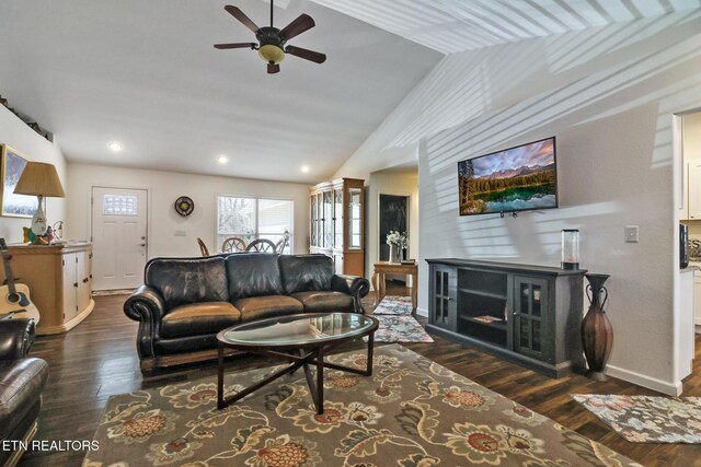 living area featuring a ceiling fan, baseboards, lofted ceiling, recessed lighting, and dark wood-style flooring