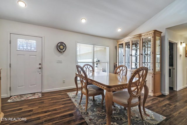 dining room featuring lofted ceiling, recessed lighting, dark wood-style floors, and baseboards