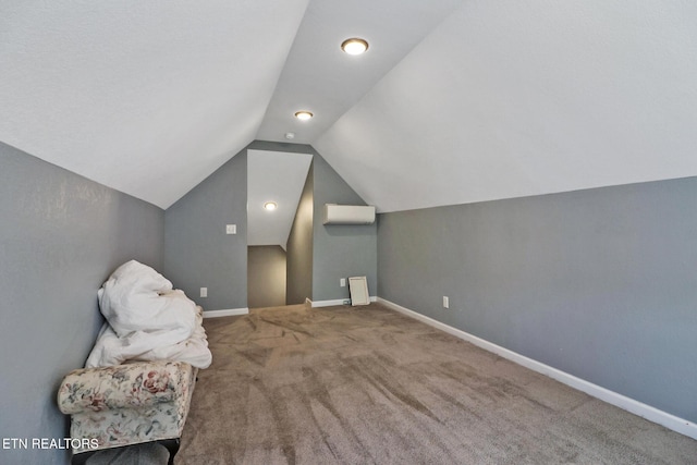 bonus room featuring baseboards, carpet floors, and vaulted ceiling