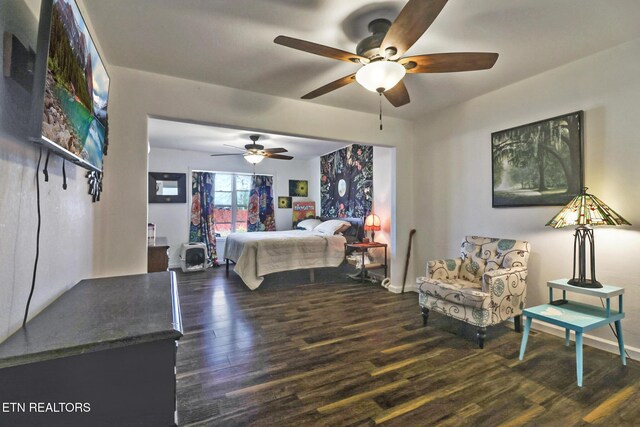 bedroom with a ceiling fan and wood finished floors