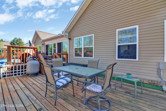 deck featuring outdoor dining space