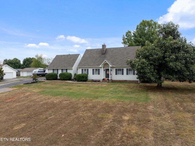 view of front of home with crawl space, roof with shingles, a chimney, and a front lawn