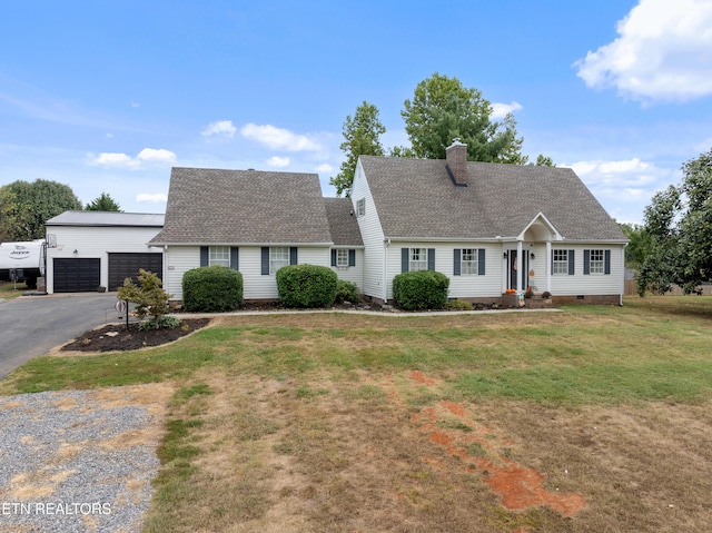 new england style home with a chimney, crawl space, a garage, an outdoor structure, and a front lawn