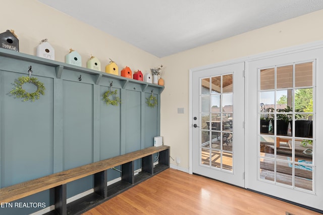 mudroom with wood finished floors