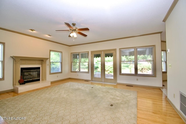 1689 Peppertree Dr, Alcoa, TN 37701 - unfurnished living room with a ceiling fan, light wood-style floors, a fireplace, and ornamental molding