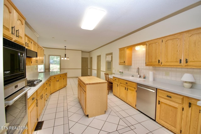 1689 Peppertree Dr, Alcoa, TN 37701 - kitchen with appliances with stainless steel finishes, crown molding, backsplash, butcher block counters, and a kitchen island