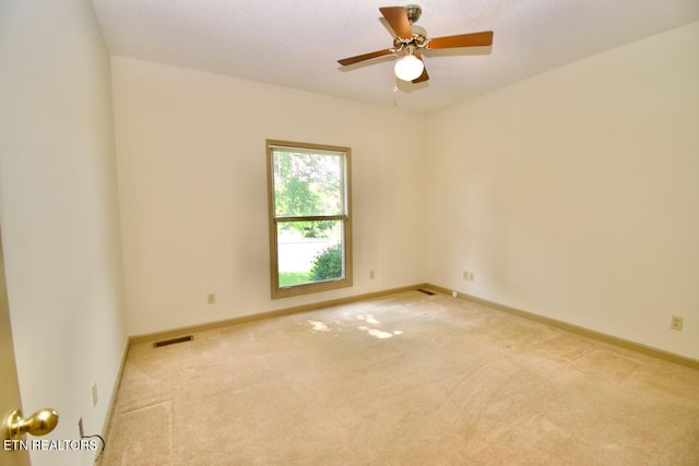 1689 Peppertree Dr, Alcoa, TN 37701 - empty room featuring light carpet and a ceiling fan