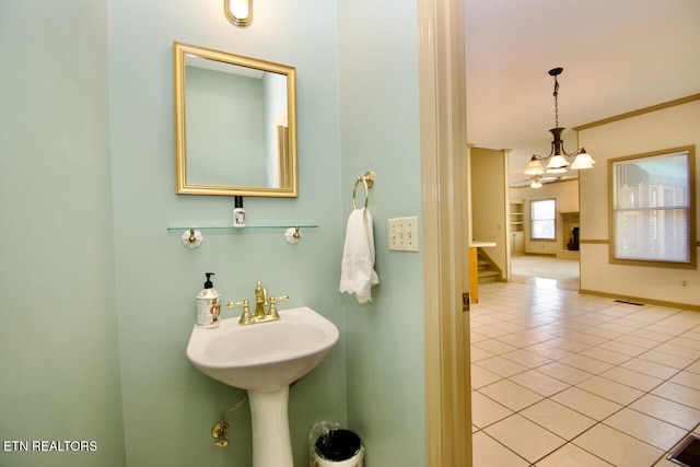 1689 Peppertree Dr, Alcoa, TN 37701 - bathroom with a chandelier and tile patterned flooring