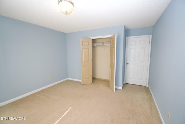 1689 Peppertree Dr, Alcoa, TN 37701 - unfurnished bedroom featuring light carpet and a closet