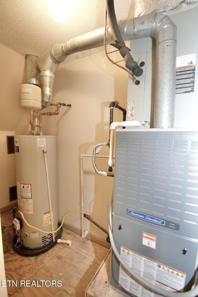 1689 Peppertree Dr, Alcoa, TN 37701 - utility room with water heater and heating unit