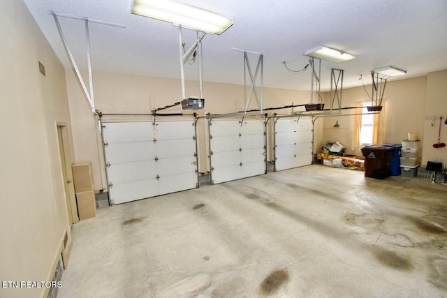 1689 Peppertree Dr, Alcoa, TN 37701 - garage featuring a garage door opener