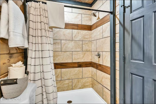 bathroom featuring a stall shower