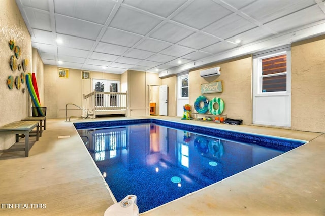 pool featuring a wall mounted AC