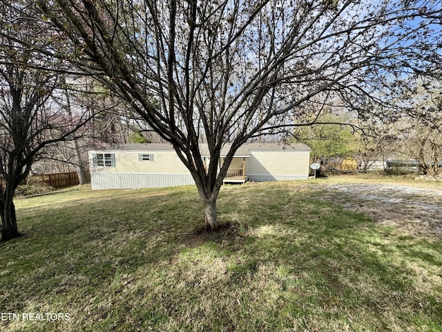 view of yard with fence