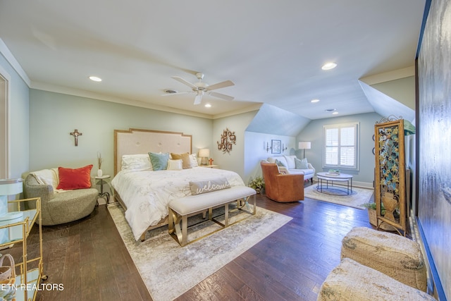 bedroom with ornamental molding, vaulted ceiling, and hardwood / wood-style floors