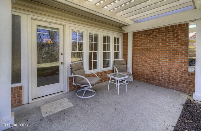 view of patio with french doors and a pergola