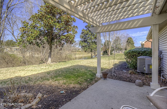 view of yard with a pergola, a patio area, and central air condition unit