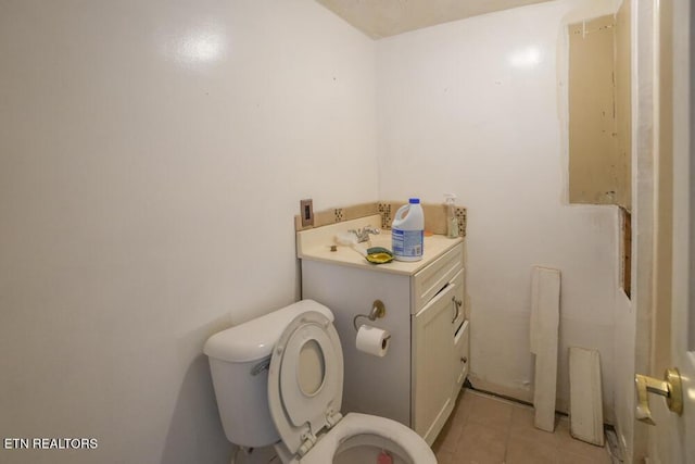 bathroom featuring toilet and tile patterned floors