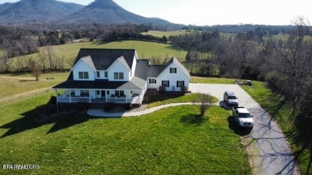 aerial view with a rural view and a mountain view