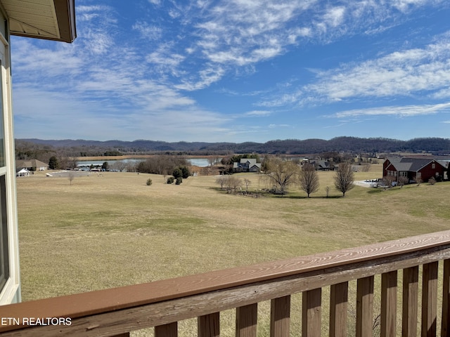 view of mountain feature with a water view