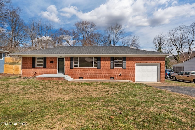 single story home featuring driveway, a front lawn, crawl space, and brick siding