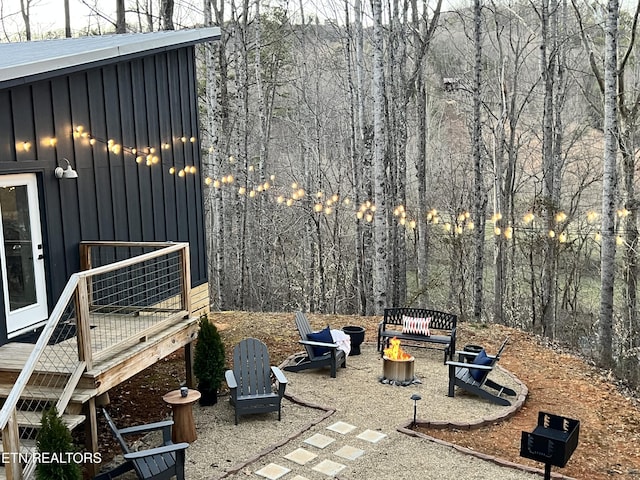 view of patio / terrace with a fire pit