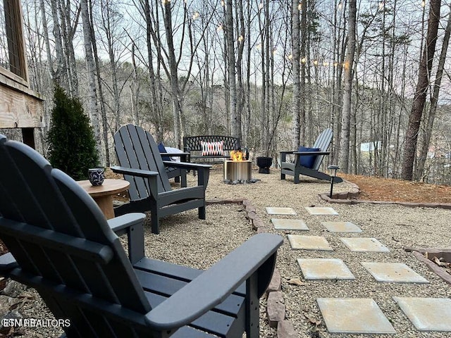 view of patio featuring a fire pit