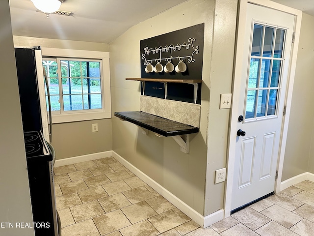 94 Hilltop Ln, Norris, TN 37828 - entryway with baseboards, visible vents, and lofted ceiling