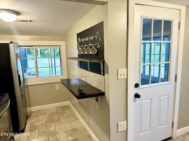 94 Hilltop Ln, Norris, TN 37828 - doorway to outside with baseboards, vaulted ceiling, and visible vents
