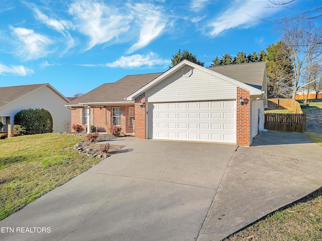 ranch-style house featuring driveway, a front yard, a garage, and brick siding