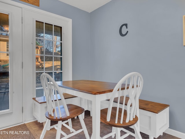 dining area featuring plenty of natural light