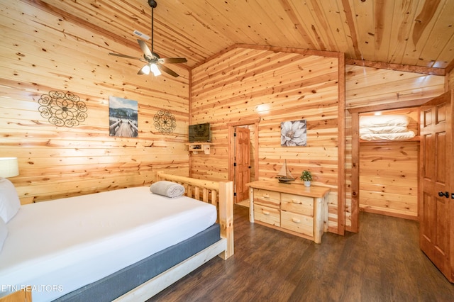 bedroom with dark wood-type flooring, lofted ceiling, wood ceiling, and wooden walls