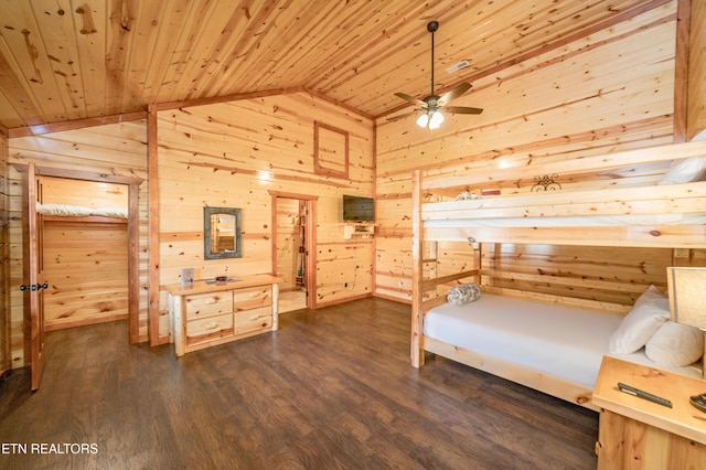 bedroom with lofted ceiling, wood ceiling, wooden walls, and dark wood-style flooring