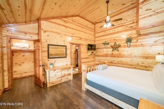 bedroom featuring vaulted ceiling, wood ceiling, wood walls, and dark wood-style floors