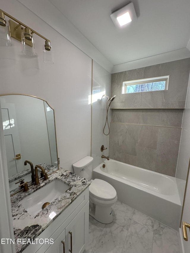 bathroom with marble finish floor, bathing tub / shower combination, toilet, and vanity