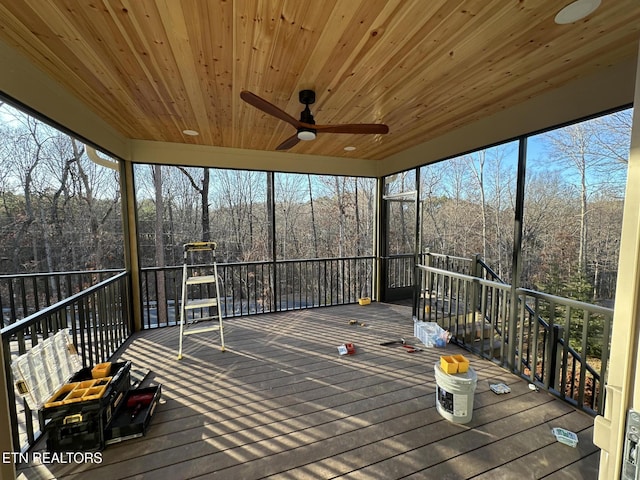 unfurnished sunroom featuring wooden ceiling