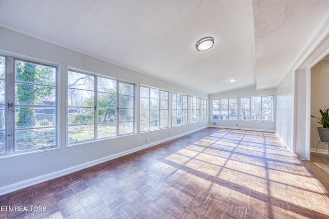 unfurnished sunroom with vaulted ceiling