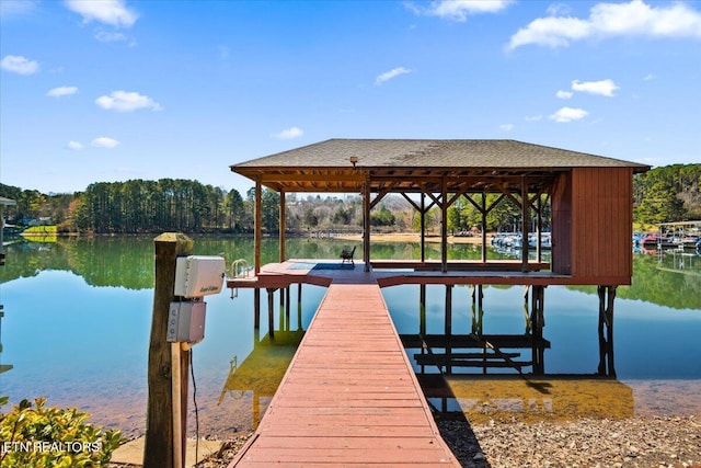 view of dock with a water view