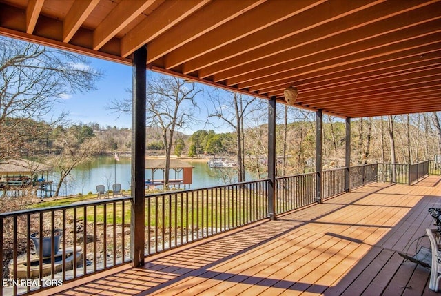 deck featuring a water view