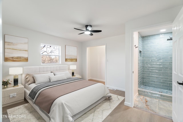 2247 W Gilbert Ln, Knoxville, TN 37920 - bedroom with wood finished floors, baseboards, and ceiling fan