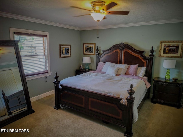 bedroom with light colored carpet, crown molding, baseboards, and ceiling fan