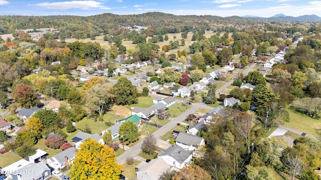 birds eye view of property with a residential view and a mountain view