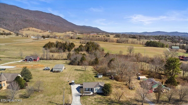 bird's eye view with a rural view and a mountain view