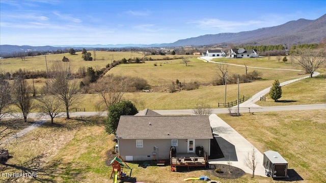 drone / aerial view with a rural view and a mountain view