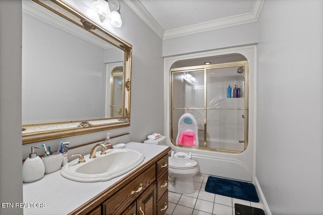 full bathroom with toilet, ornamental molding, a textured ceiling, vanity, and tile patterned floors