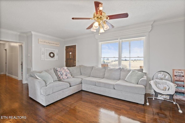 living room featuring a textured ceiling, dark wood finished floors, and crown molding