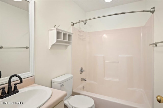 full bath featuring toilet,  shower combination, and vanity