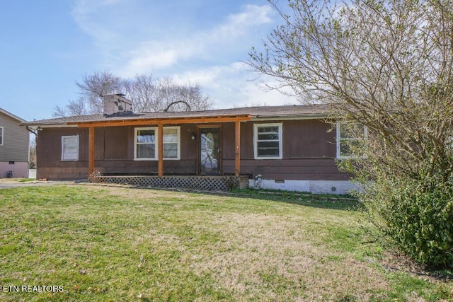 ranch-style home with a chimney, covered porch, crawl space, and a front yard