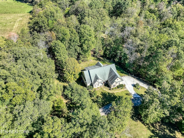 bird's eye view with a forest view